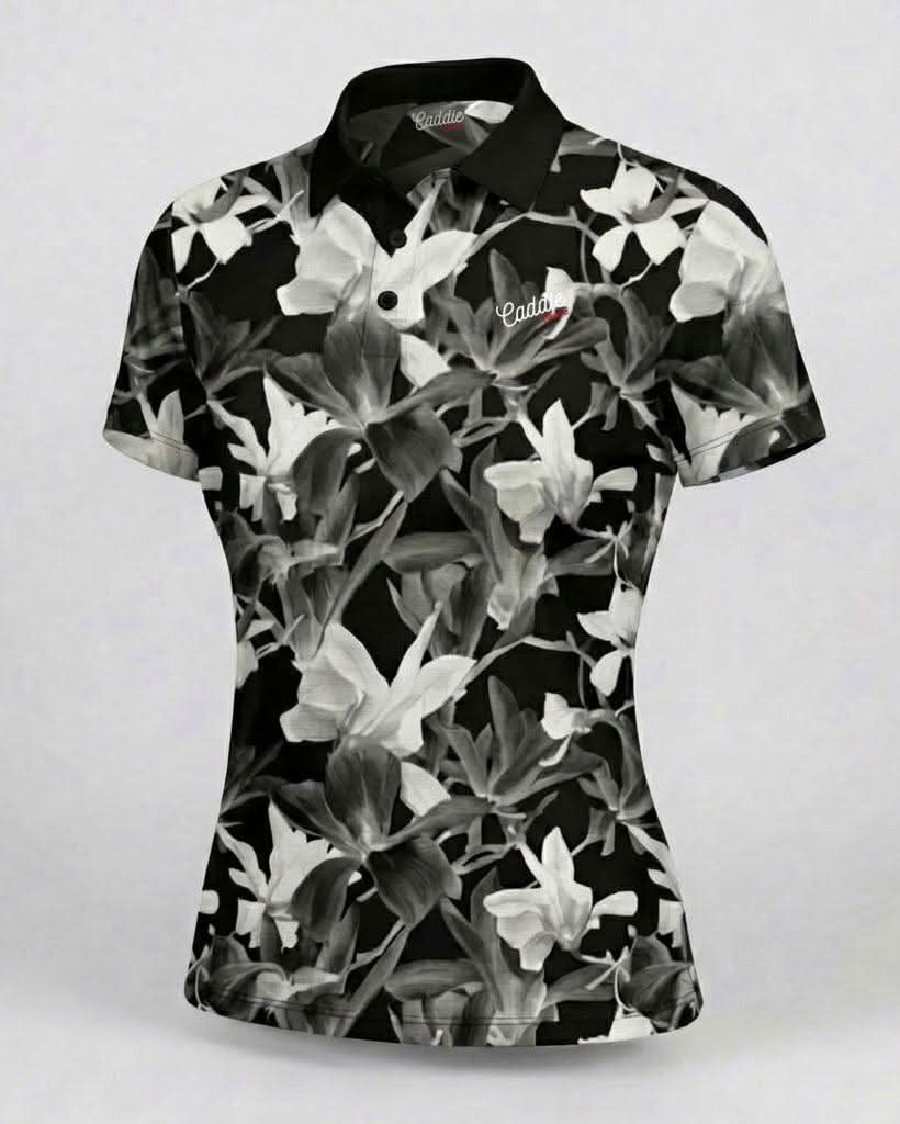Black and white floral patterned polo shirt on a white background