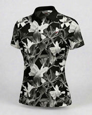 Black and white floral patterned polo shirt on a white background