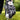 Golf glove and ball on grass with 'Caddie Couture' branding