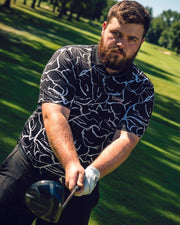 Man playing golf on a green course