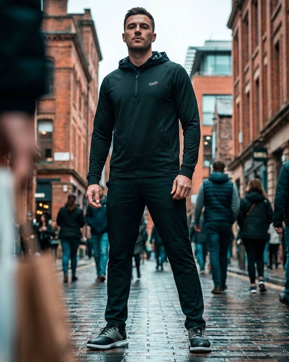Noir Signature Performance Hoodie golf lifestyle image