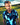 Man wearing a blue patterned shirt on a golf course