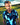 Man wearing a blue patterned shirt on a golf course