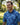 Man wearing a blue patterned shirt in a park setting