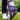 Golf glove with floral pattern on a tee with a golf ball, on a grassy background