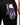 Colorful patterned glove with a brand tag on a black background