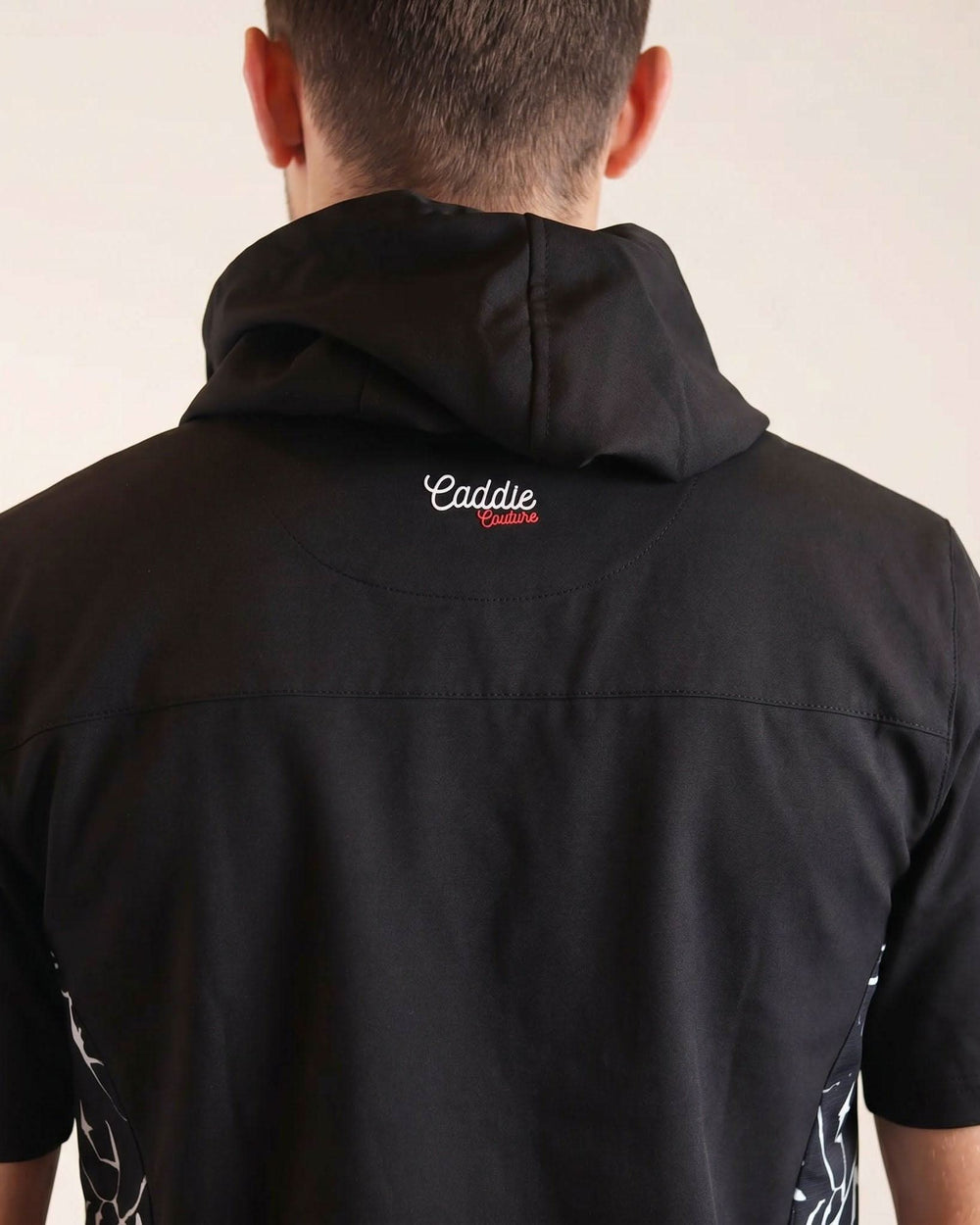 Rear hood branding on Signature Noir Windbreaker
