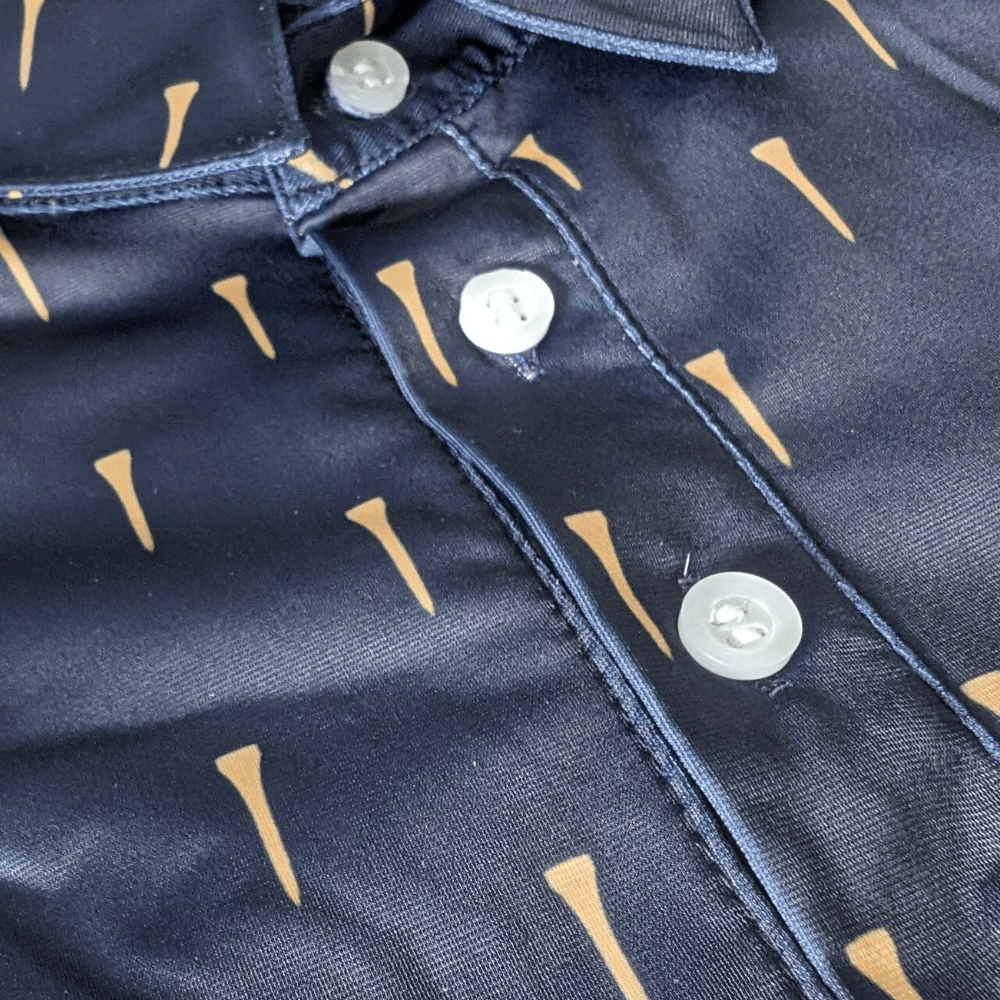 close up of tees golf polo