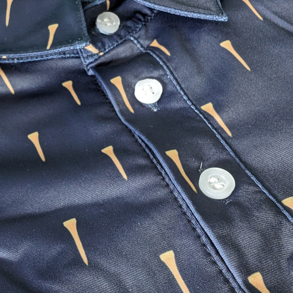 close up of tees golf polo