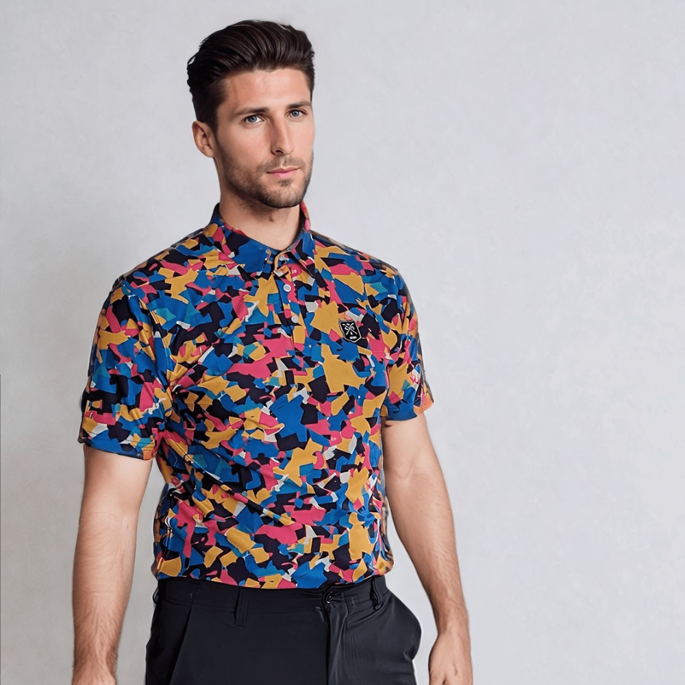 A man wearing a short-sleeved multicolor geometric patterned golf polo shirt.