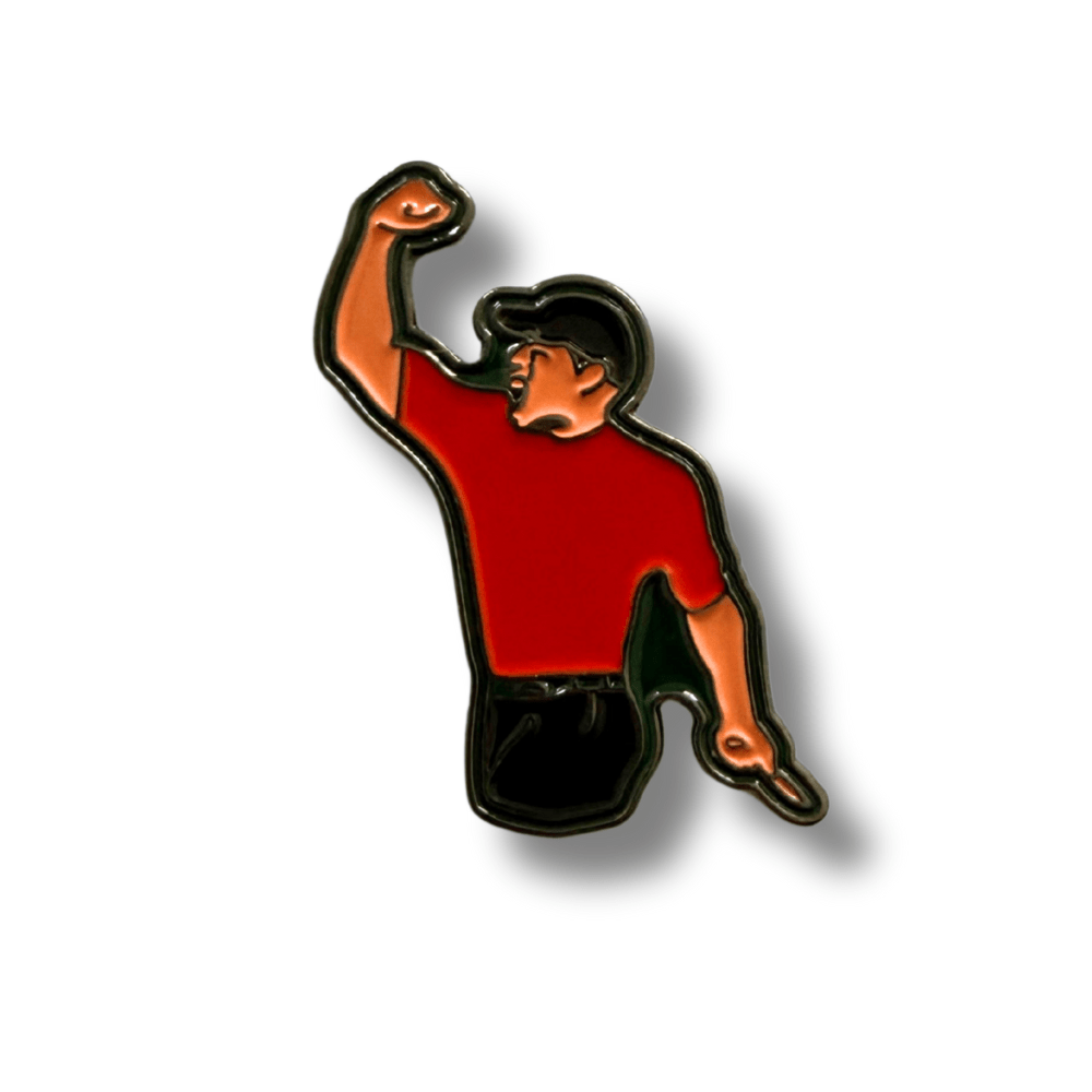 Tiger Woods Golf Ball Marker on a white background
