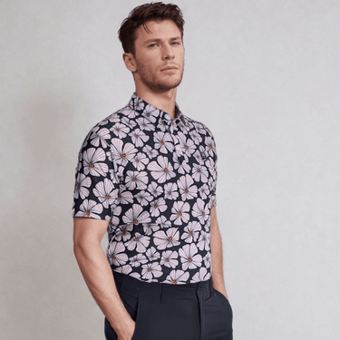 Man Wearing Floral Golf Polo side view